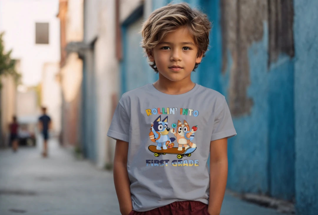 🛹🎒 Rollin’ Into First Grade – Bluey & Bingo Back-to-School Tee 🐶📚