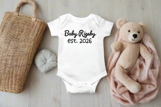“Baby Rigsby est. 2026” – Custom Newborn Onesie 🍼💖